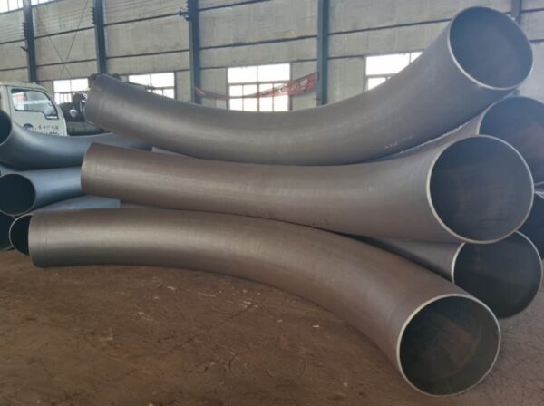 Alloy bend for oil and gas pipeline